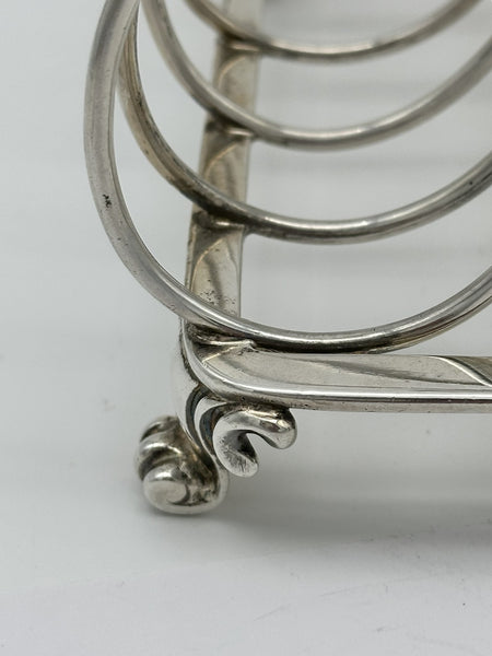 Toast Rack. English Sterling Silver. London 1863. R & S Garrard & Co