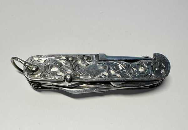 Sterling Antique Engraved Pocket Knife. Ten Utilities. 3-1/4 Length